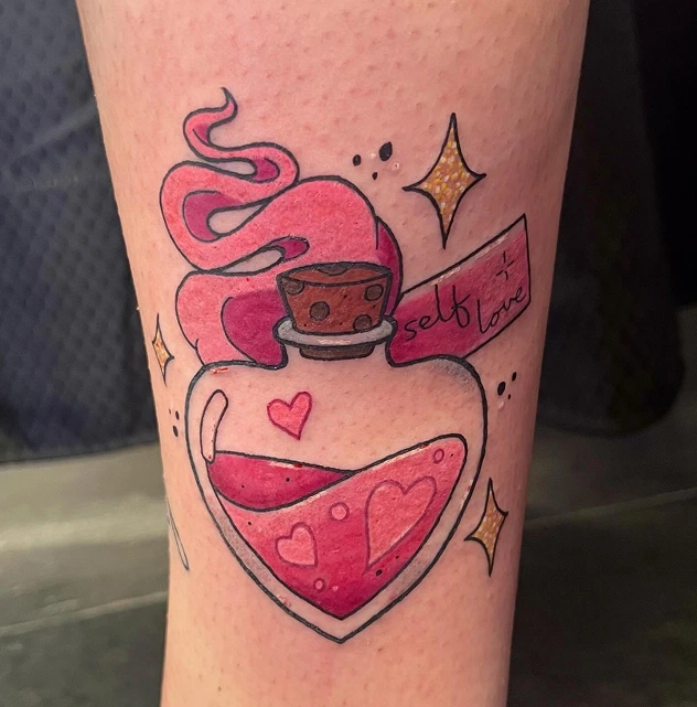 Small potion bottle tattoo in pink and black Disney style with "self Love" text